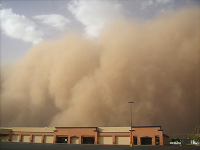 sandstorm looms over building